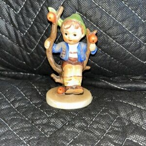 Hummel Figurine Boy on Swing with Blue Jacket and Green Hat